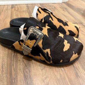 Schultz Black and Tan calf hair Mules with Silver Buckle